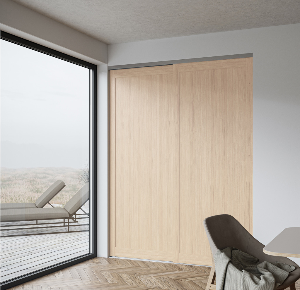 Skyvedørsfront i eikefiner hvittonet